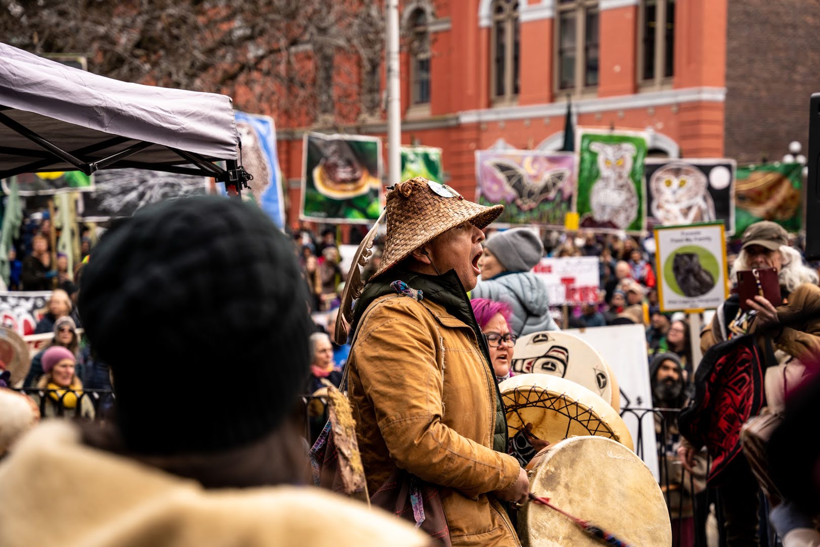 WSANEC land defender and Coast Salish storyteller Chiyokten singing during the United For Old Growth March and Rally in Victoria, British Columbia.